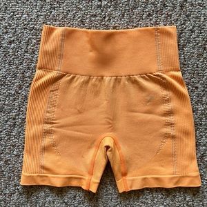 Gymshark Ultra Seamless Shorts in Orange size Small